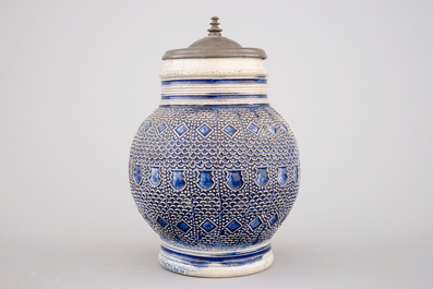 A globular Westerwald stoneware jug with applied decoration, 17th C.