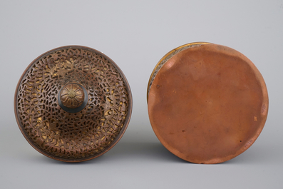 A cylindrical brass and bronze box and cover, 16/17th C., probably Venice