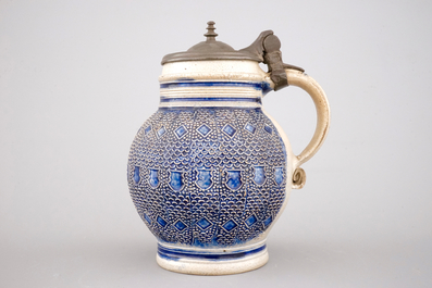 A globular Westerwald stoneware jug with applied decoration, 17th C.