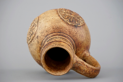 A Raeren armorial stoneware jug, ca.1600
