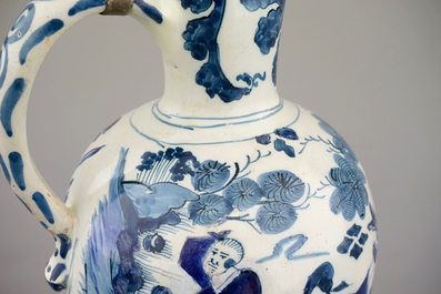 A Dutch Delft blue and white chinoiserie jug, 17th C. and a stoneware mug, 15th C.