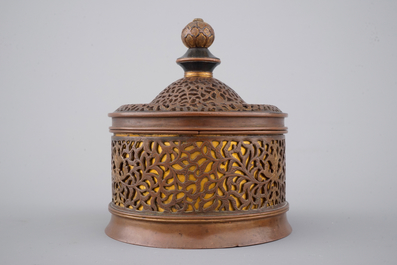 A cylindrical brass and bronze box and cover, 16/17th C., probably Venice
