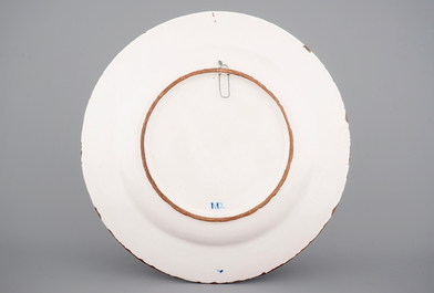 A massive French faience armorial dish, Rouen, 19th C.