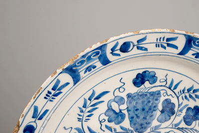 A set of 3 Dutch Delft blue and white dishes with grape vines, 18th C.
