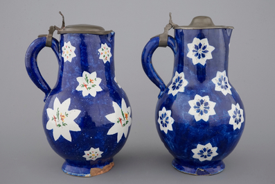 Two Brussels faience blue ground pewter-mounted jugs, 18th C.
