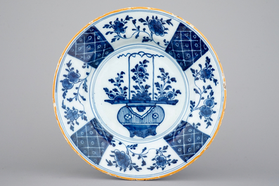 A set of 5 Dutch Delft blue/white and polychrome plates 18th C.
