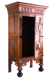 A neo renaissance one door oak cabinet, 19th C.
