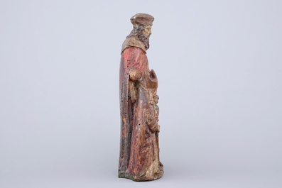 A carved and painted wood group of &quot;Saint-Nicholas and the children&quot;, 17/18th C.