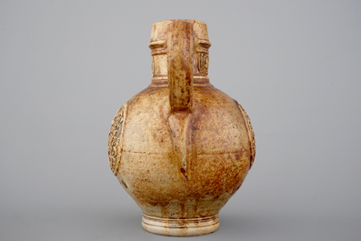 A Raeren armorial stoneware jug, ca.1600