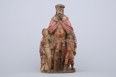 A carved and painted wood group of &quot;Saint-Nicholas and the children&quot;, 17/18th C.