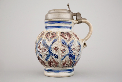 A manganese and blue Westerwald pewter-mounted globular jug, 17th C.