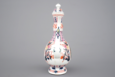 A tall famille rose ewer with cover for the Indian market, 19th C.