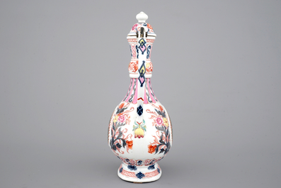A tall famille rose ewer with cover for the Indian market, 19th C.