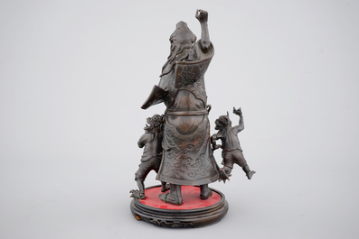 A Chinese mythological bronze group, 19/20th C.