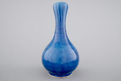 A Chinese monochrome blue garlic vase with incised dragon decoration, 19th C