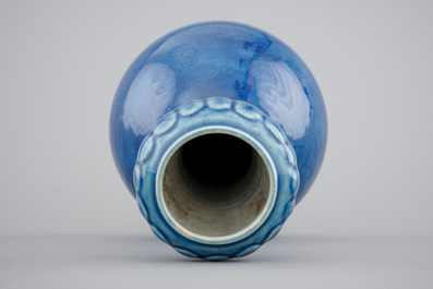 A Chinese monochrome blue garlic vase with incised dragon decoration, 19th C