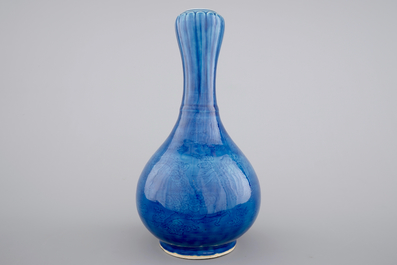 A Chinese monochrome blue garlic vase with incised dragon decoration, 19th C