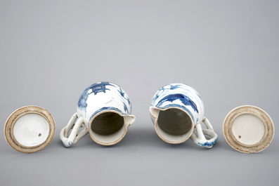 A pair of Chinese blue and white jugs with cover, 18th C.