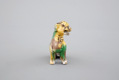 A Chinese spinach and egg glazed model of a dog, Kangxi, ca. 1700