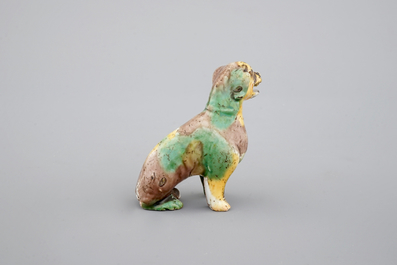 A Chinese spinach and egg glazed model of a dog, Kangxi, ca. 1700