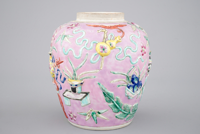 A Chinese pink ground relief-decorated ginger jar, 19th C.