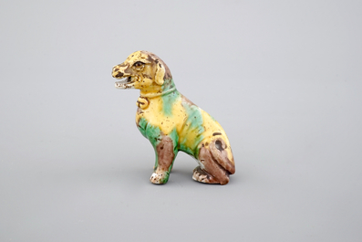 A Chinese spinach and egg glazed model of a dog, Kangxi, ca. 1700