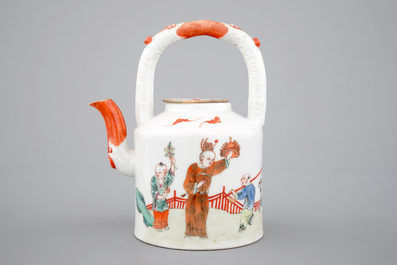 A Chinese famille rose overhead-handled teapot, 19th C