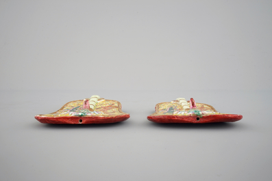 A pair of Chinese porcelain leaf shaped familie rose fans, 19th C