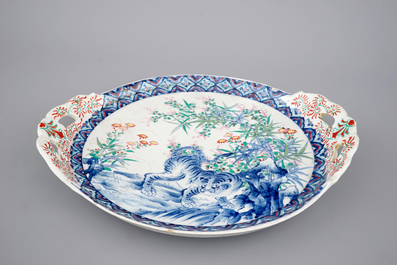 A Japanese porcelain dish decorated with a tiger, 19th C