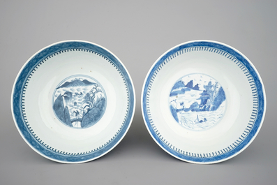 A pair of Chinese blue and white bowls decorated with landscapes, 19th C