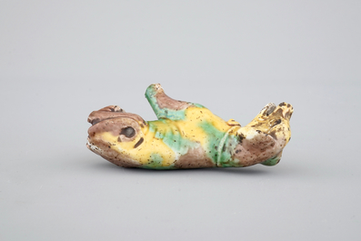 A Chinese spinach and egg glazed model of a dog, Kangxi, ca. 1700