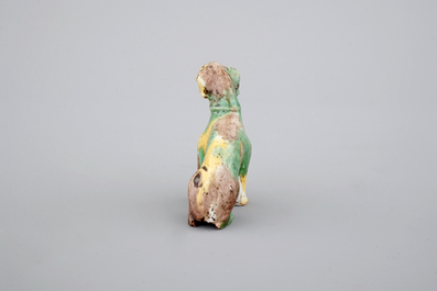 A Chinese spinach and egg glazed model of a dog, Kangxi, ca. 1700