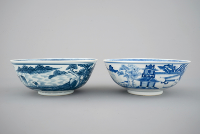 A pair of Chinese blue and white bowls decorated with landscapes, 19th C