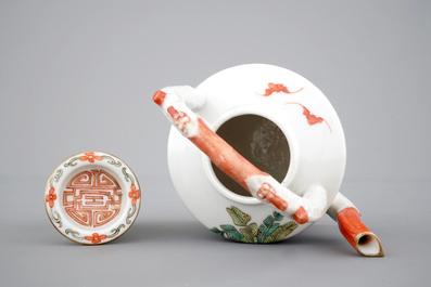 A Chinese famille rose overhead-handled teapot, 19th C