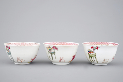 A set of three fine Chinese semi-eggshell famille rose cups and saucers, Yongzheng, 1722-1735