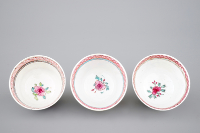 A set of three fine Chinese semi-eggshell famille rose cups and saucers, Yongzheng, 1722-1735