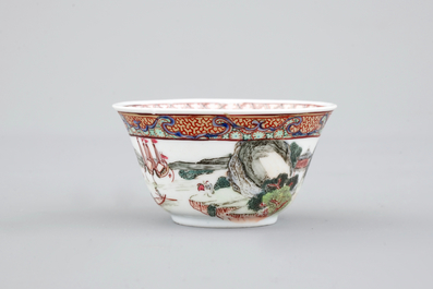 A Chinese export porcelain cup and saucer with a harbor scene, Yongzheng, 1722-1735