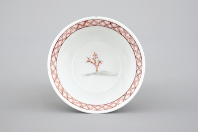 A Chinese export porcelain cup and saucer with a harbor scene, Yongzheng, 1722-1735