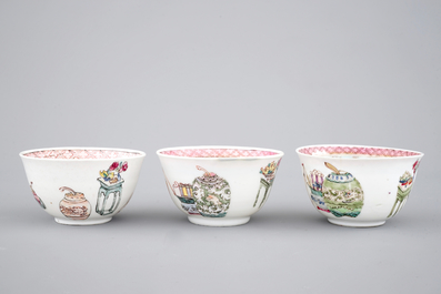 A set of three fine Chinese semi-eggshell famille rose cups and saucers, Yongzheng, 1722-1735