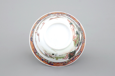 A Chinese export porcelain cup and saucer with a harbor scene, Yongzheng, 1722-1735