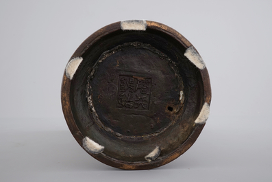 A Chinese archaistic bronze parcel-gilt gu beaker vase, 17/18th C