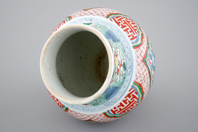 A Chinese wucai porcelain vase with fish, Transitional, Chongzhen or Shunzhi, 1628-1661