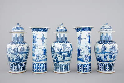 A Chinese bleu de Hue porcelain five piece garniture with acrobats 