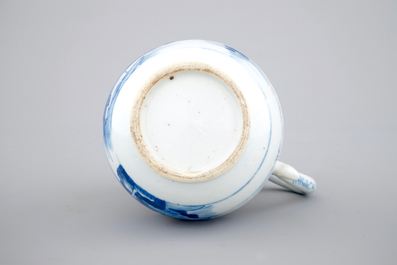 A Chinese blue and white jug with figures in a landscape, 18th C.