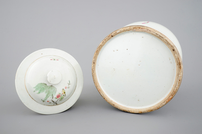 A Chinese famille rose vase and cover with birds on a branch, 19th C.