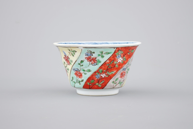 A Chinese famille verte porcelaine moulded cup and saucer, Kangxi, ca. 1700