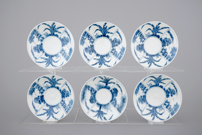 A set of six Japanese blue and white wine cups and saucers, 18/19th C.