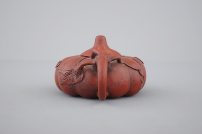 A Chinese Yixing stoneware pumpkin-shaped teapot, 19th C