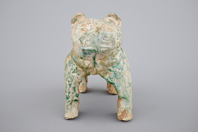 A Chinese green glazed pottery figure of a dog, presumably Han Dynasty