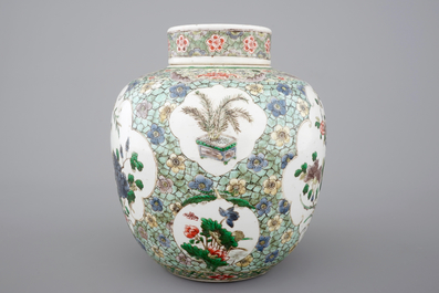 A tall famille verte ginger jar and cover, 19th C